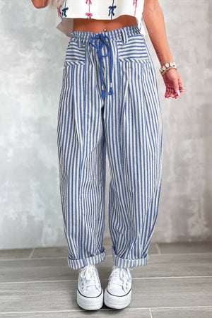 crimson red wide-leg pants featuring drawstring waist and striped