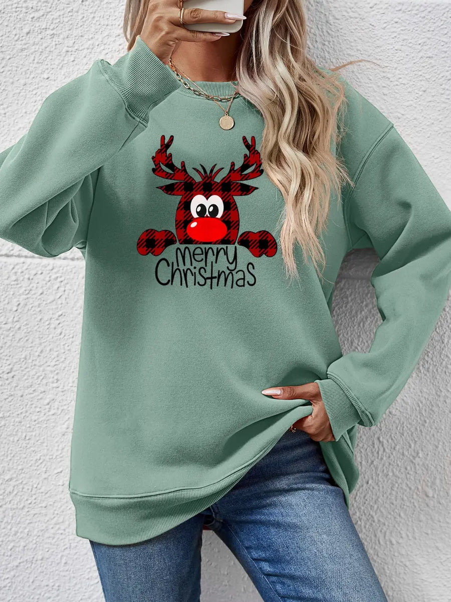 Sage green crewneck sweatshirt with plaid reindeer and Merry Christmas graphic.