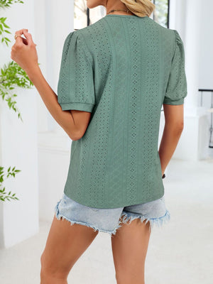 Dark Green eyelet V-neck t-shirt with puff sleeves and a diamond pattern.