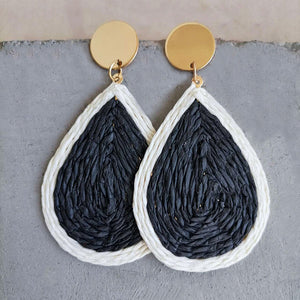 Black raffia teardrop earrings with white trim and gold disc tops