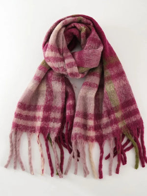 Textured plaid fringe wrap scarf in pink/white/gray plaid with fuzzy texture.