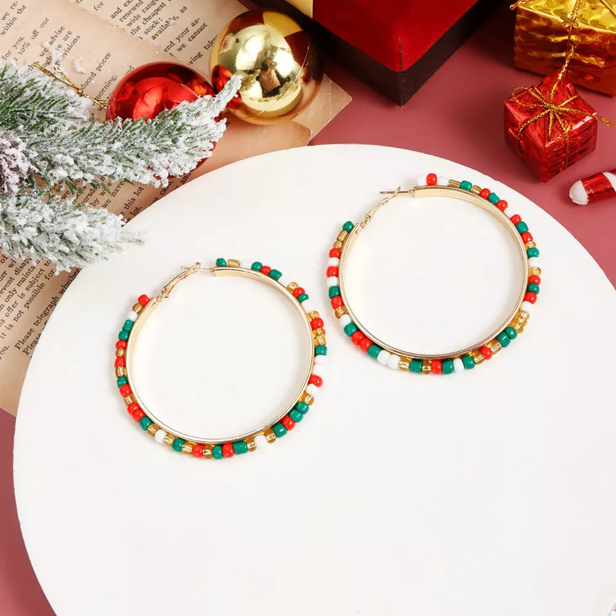 red earrings featuring beaded and beaded