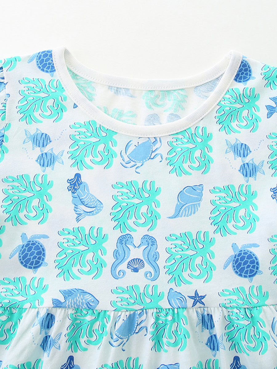 Toddler cotton dress with ocean print featuring mermaids, seahorses, turtles, fish, and coral.