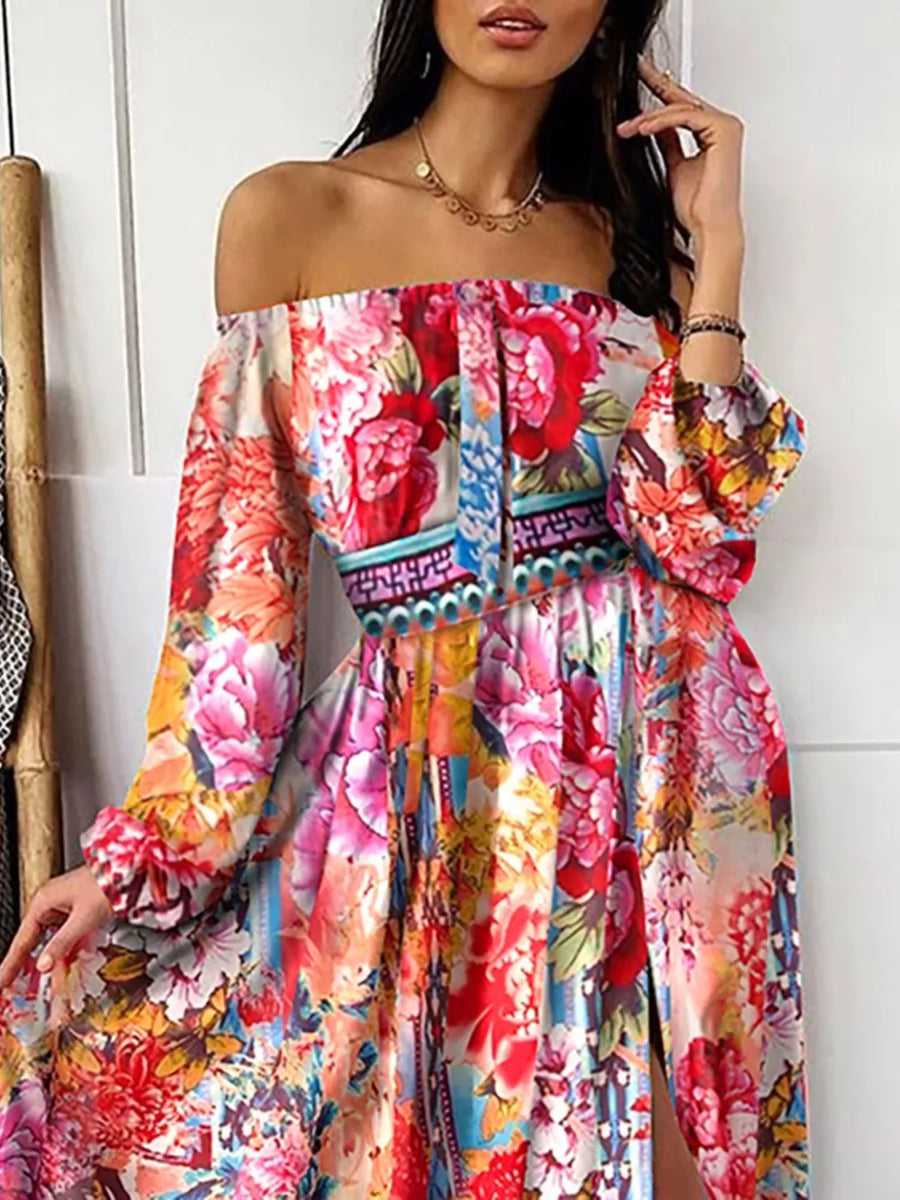 Vibrant off-shoulder maxi dress with balloon sleeves and a high slit, featuring a colorful floral print.