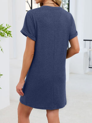 Navy blue t-shirt dress with cuffed short sleeves and a V-neckline, above the knee length.