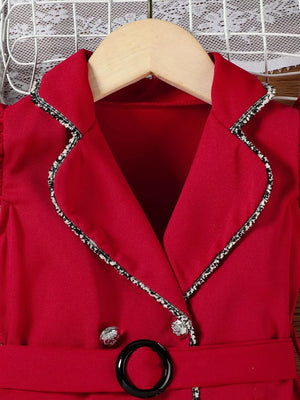 Wine red toddler dress with double-breasted detail, contrast trim, buttons, and belted waist.