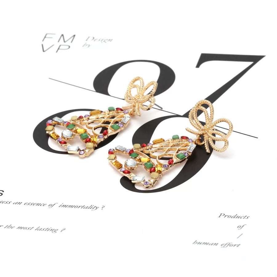 18K Gold-Plated, Zinc alloy, Rhinestone Care instructions: Avoid wearing during earrings in emerald green with dangle
