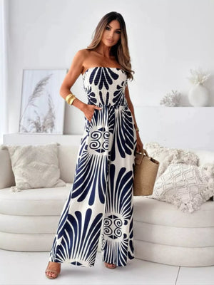 Strapless wide-leg romper with tribal print in navy and white polyester.