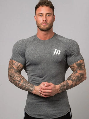 Dark Gray Performance Fit Raglan Tee with white logo and short sleeves.