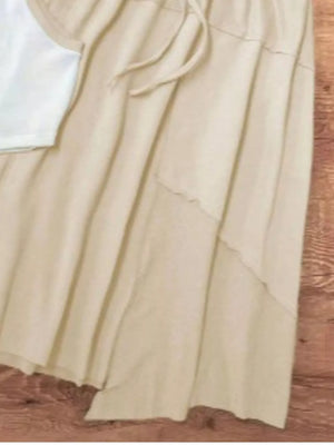 Beige linen drawstring shorts with raw hem detail