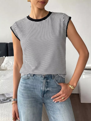 Black and white striped crew neck tee with black trim on sleeves and neckline.