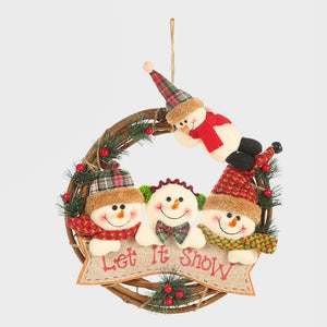 Festive wreath with plush snowmen characters and "Let It Snow" banner, decorated with pine and berries.