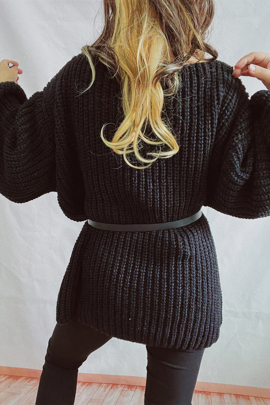 Black oversized ribbed knit mini dress with belt detail