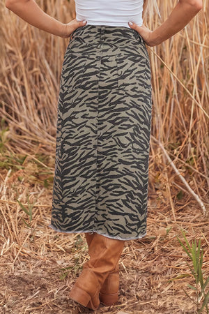 black midi skirt featuring buttoned and zebra-print