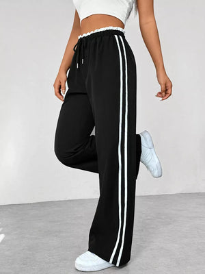 Chic black wide leg maternity pants with drawstring and side stripes.