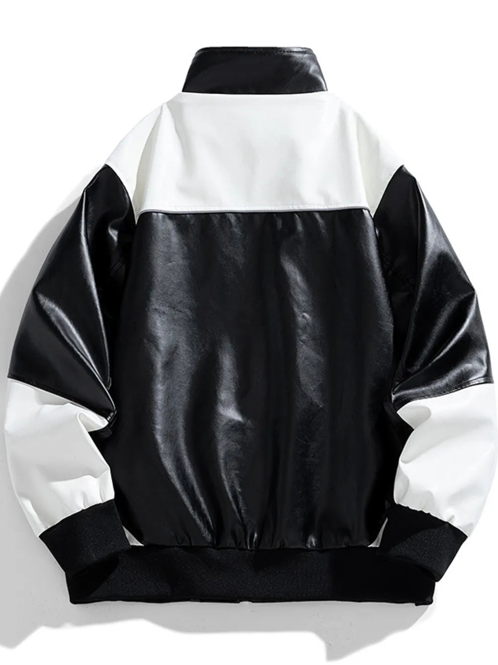 Black and white colorblock leather jacket with a stand-up collar and ribbed cuffs.