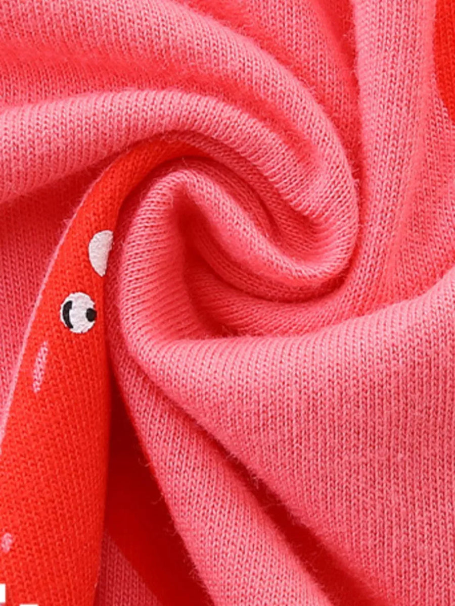 Baby dress in pink cotton with a playful red heart print detail.