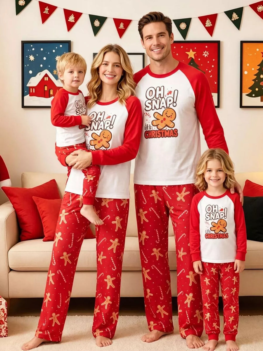 red pajama set with graphic print, gingerbread man print, candy cane print and crew neck