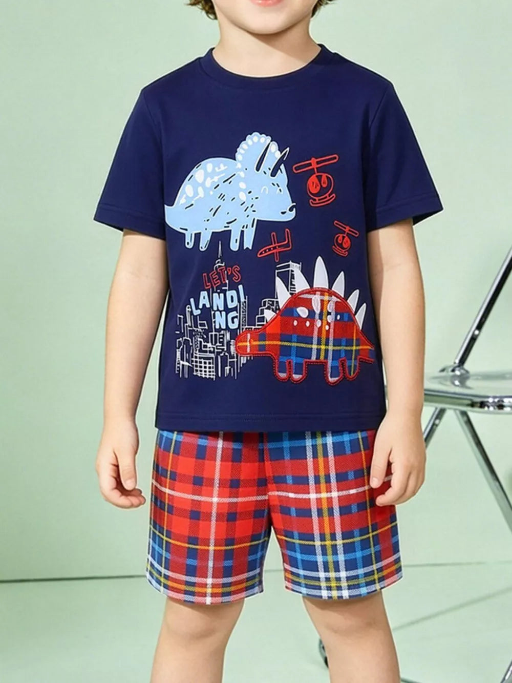 Navy dinosaur graphic tee and red plaid shorts set for baby boys.