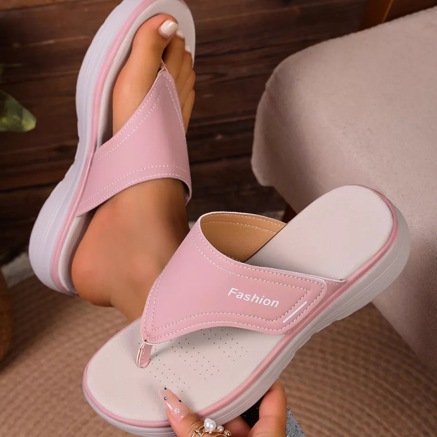 Pink toe post platform sandals with white accents and "Fashion" text.