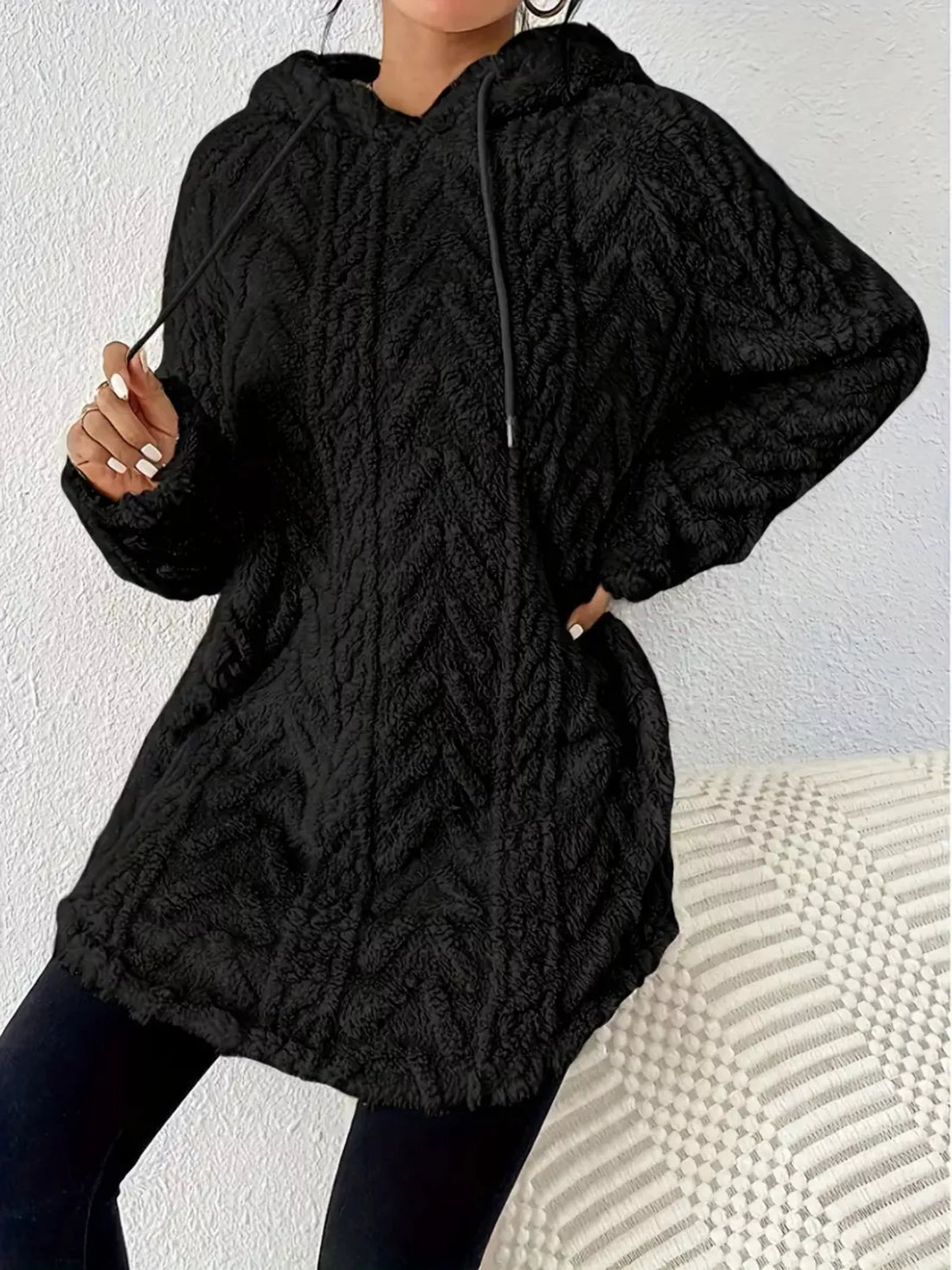 Black textured drawstring fleece hoodie with chevron pattern
