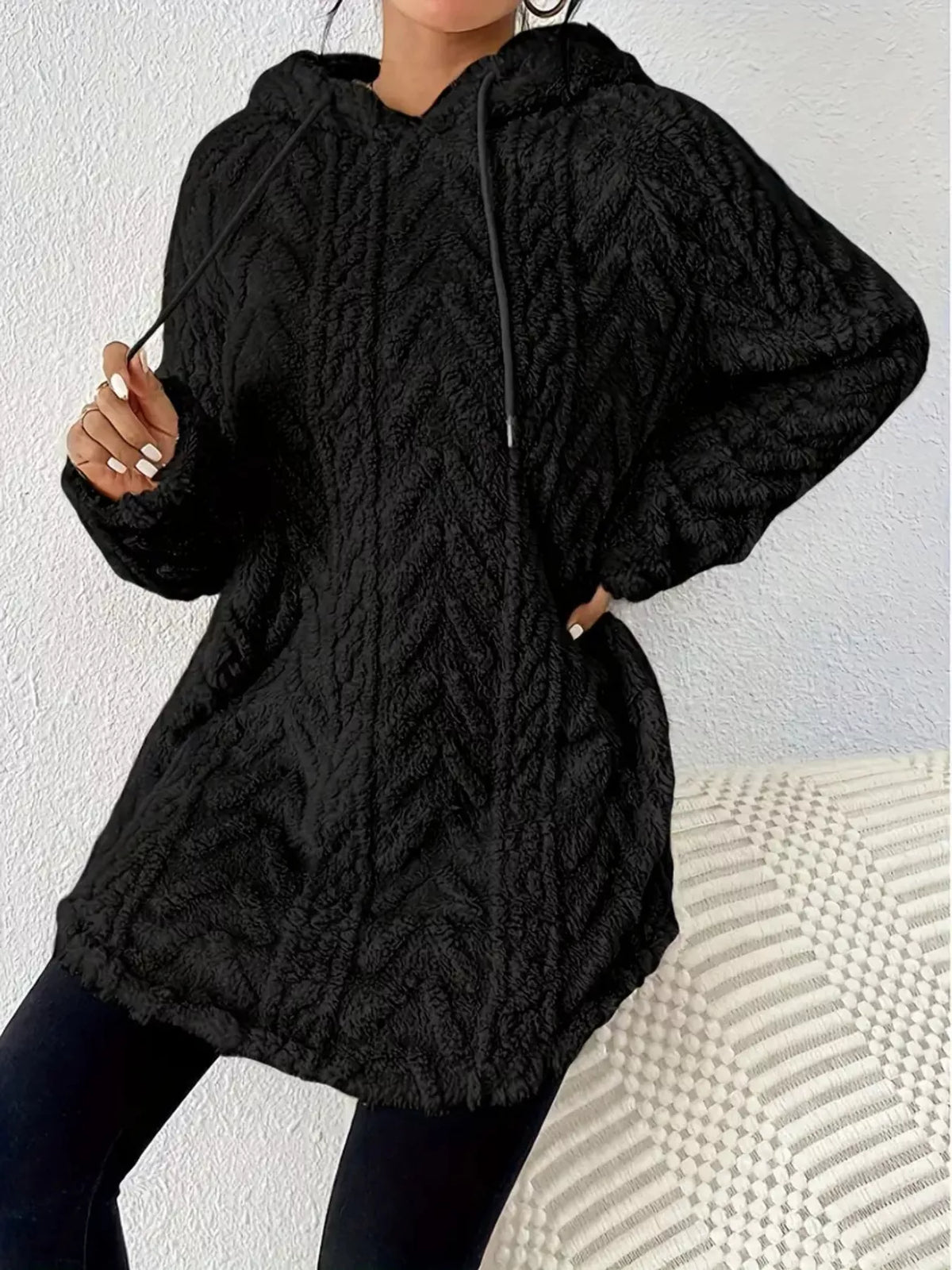 Black textured drawstring fleece hoodie with chevron pattern