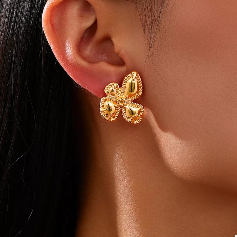 earrings in gold with floral and flower design