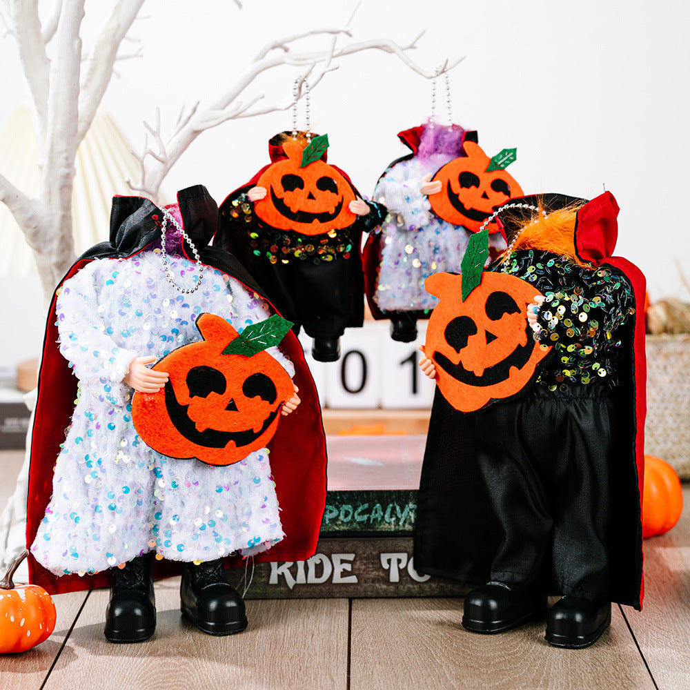 Halloween dolls with sequin capes and pumpkin cutouts, one white sequin doll.