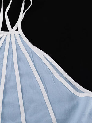 Light blue linen blend camisole with white trim and spaghetti straps.