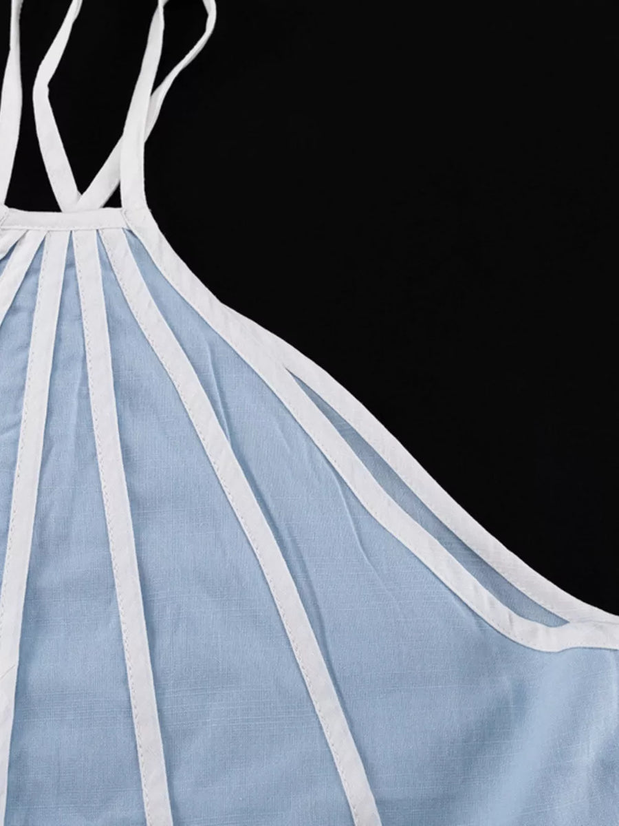 Light blue linen blend camisole with white trim and spaghetti straps.