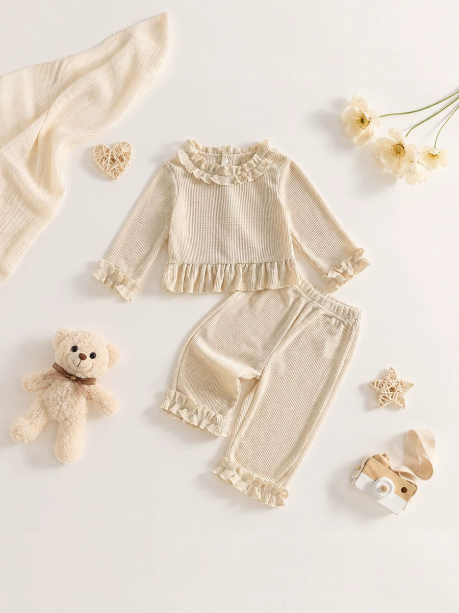 95% cotton, 5% polyester Care instructions: Machine wash cold pajama set in Apricot Color with regular silhouette