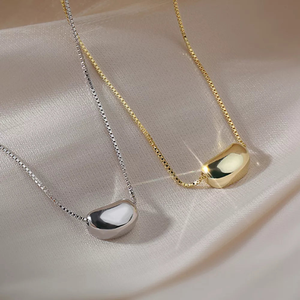 Sterling silver and gold bean pendant necklaces with box chains
