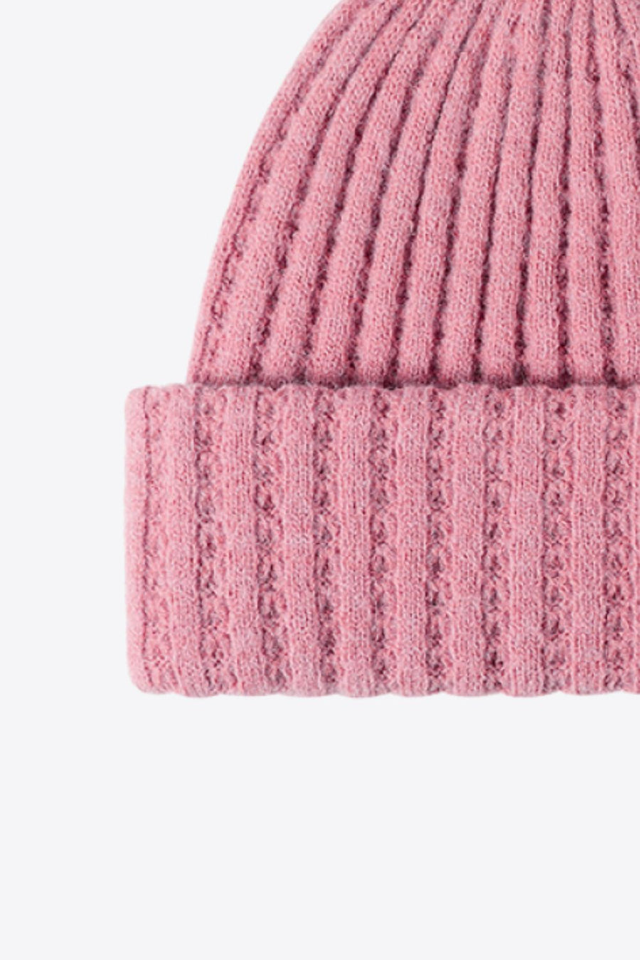 Pink acrylic ribbed knit beanie with textured cuff detail