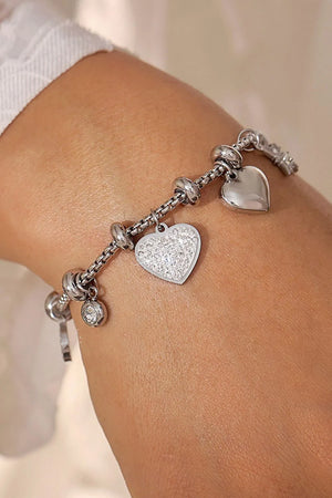 Silver charm bracelet with heart and crystal charms