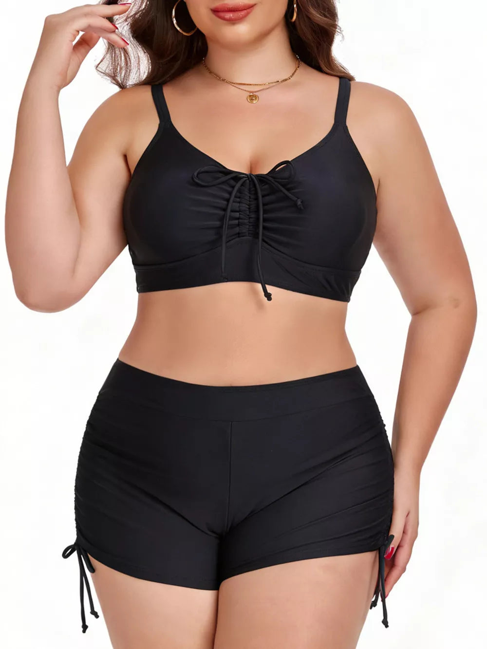Black plus size adjustable swimwear set with drawstring details on top and shorts.