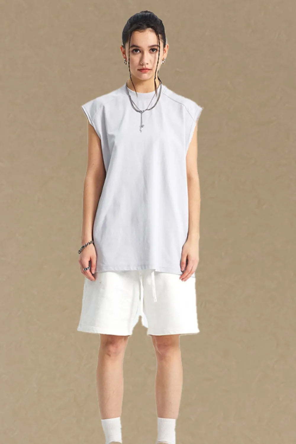 Boxy shoulder cut tank top in light gray with a relaxed fit.