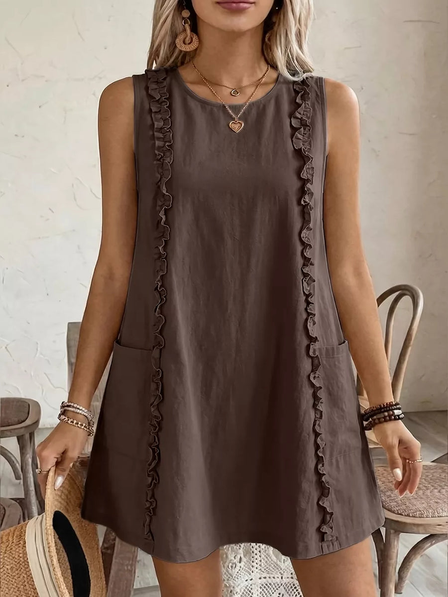 Coffee brown sleeveless dress with frill trim and pockets.