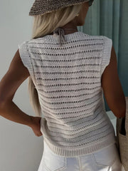 Beige open-stitch sleeveless knit tank top with horizontal stripe pattern and tie detail at neck.
