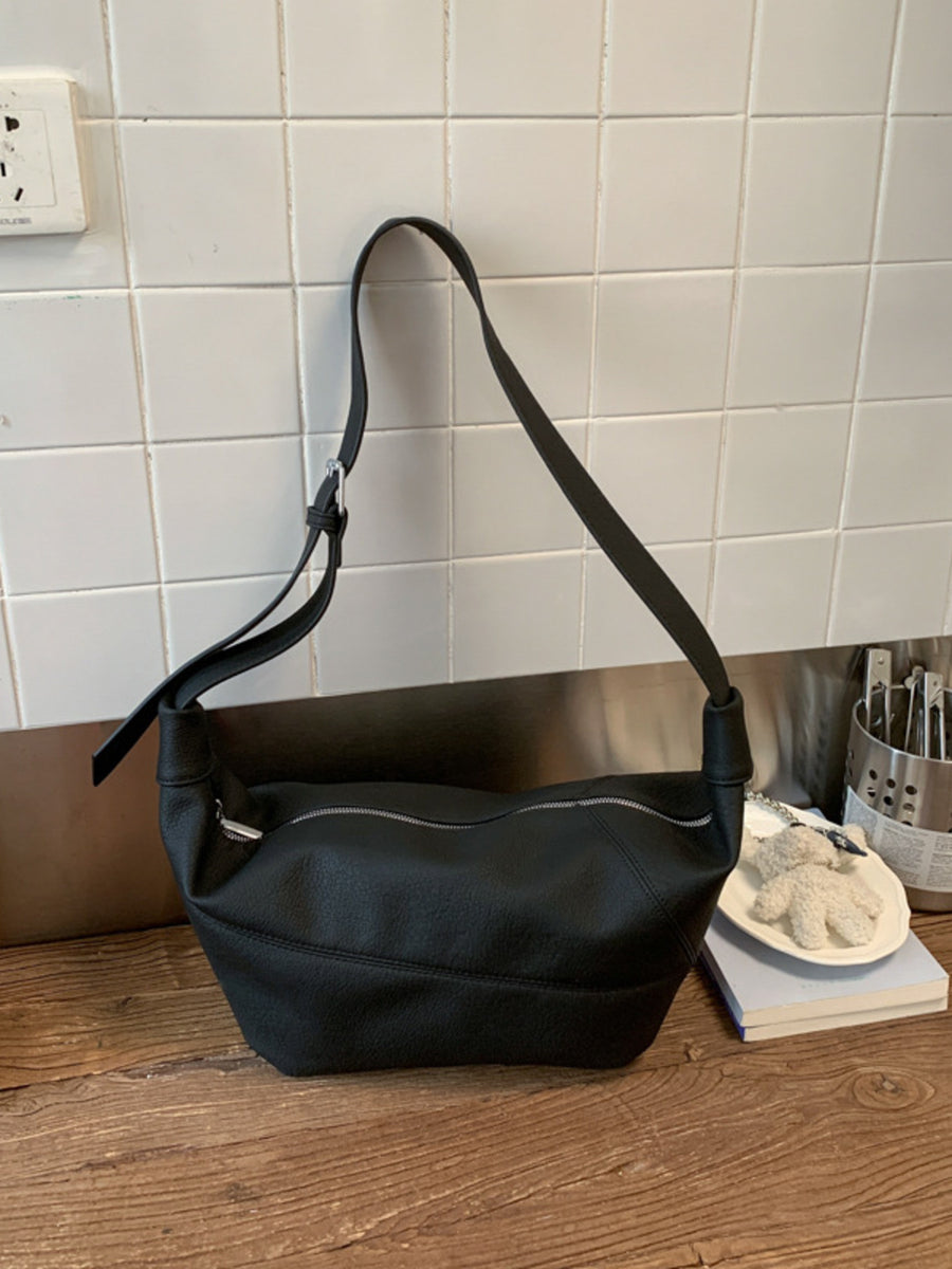crossbody bag in Black with adjustable straps and small