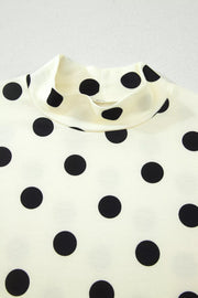 Cream polka dot mock neck top