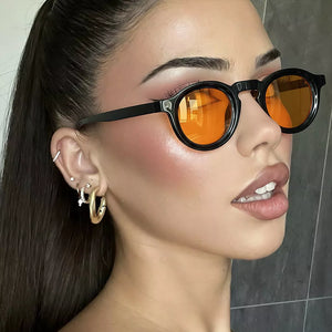 PC Frame material: Polycarbonate Lens material: Polycarbonate Temple material: P ACCESSORIES in Caramel with round silhouette