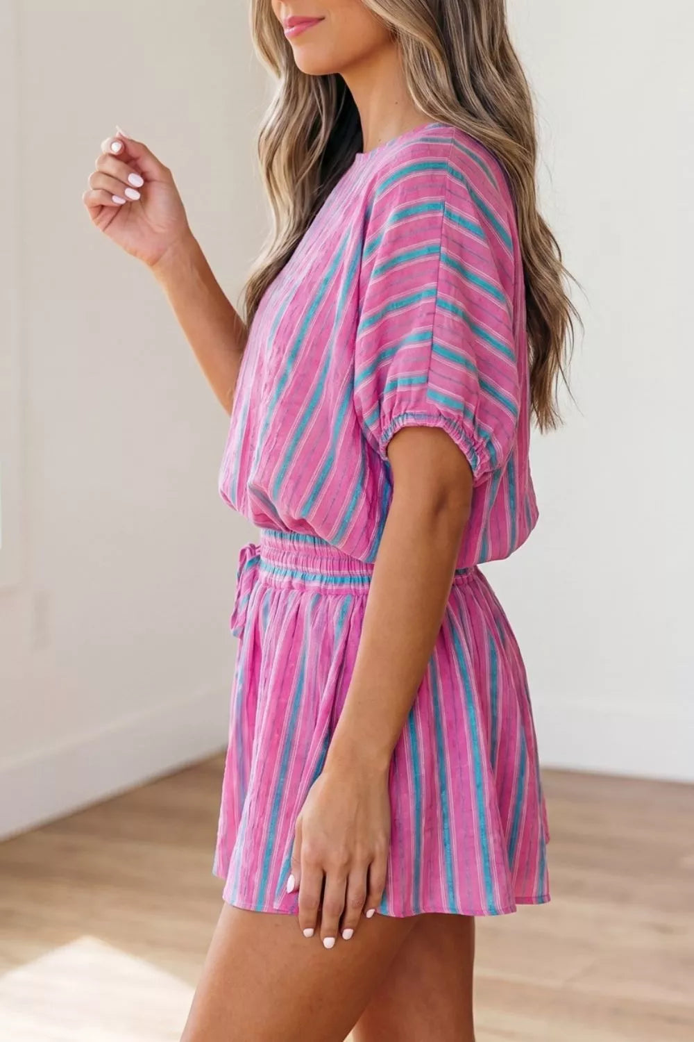 Vibrant stripe two-piece set with drawstring waist and puff sleeves.