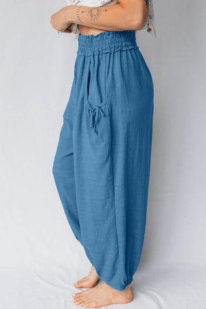 Blue cotton blend jogger pants with smocked waist and drawstring pockets