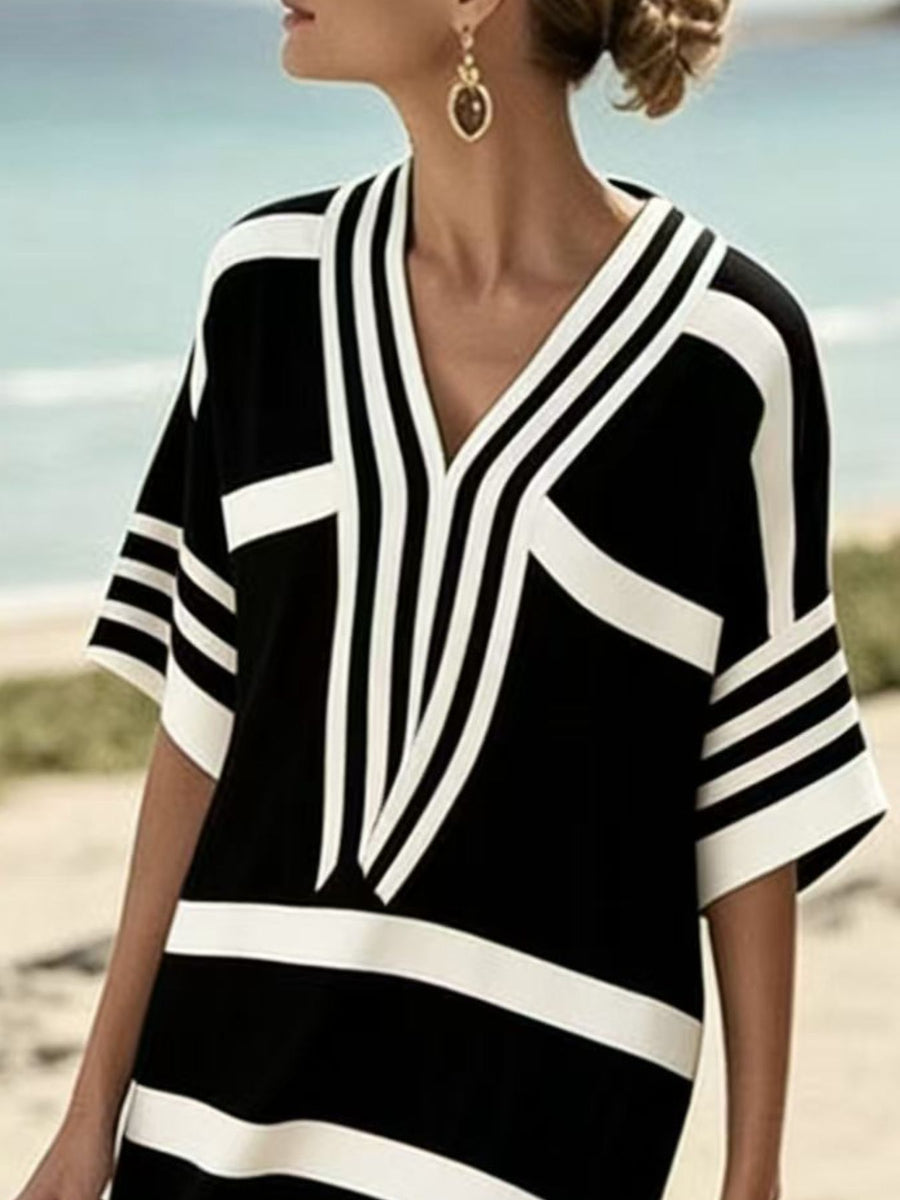 Black and white striped half sleeve midi dress with V-neck