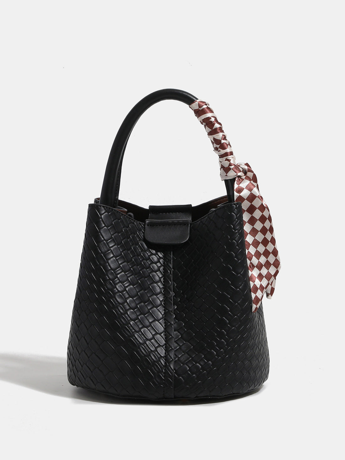 handbag in black featuring woven texture and bucket fit