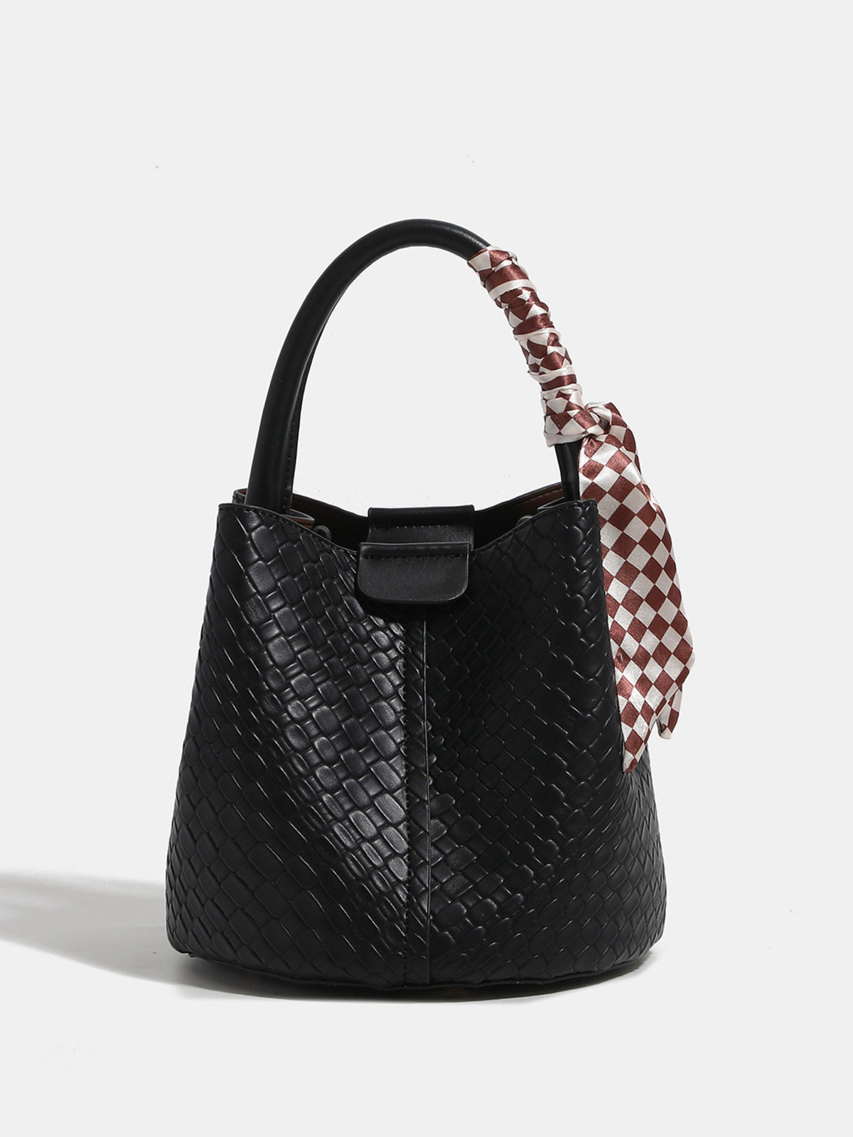 handbag in black featuring woven texture and bucket fit