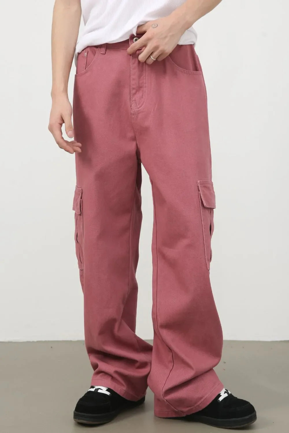 Dusty Rose wide-leg cargo trousers with multiple pockets and a casual fit.