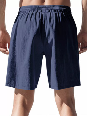 Navy blue chino shorts with elastic drawstring waist and relaxed fit.