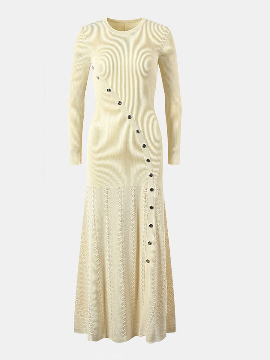 Pastel yellow ribbed knit maxi dress with decorative buttons and open knit skirt.