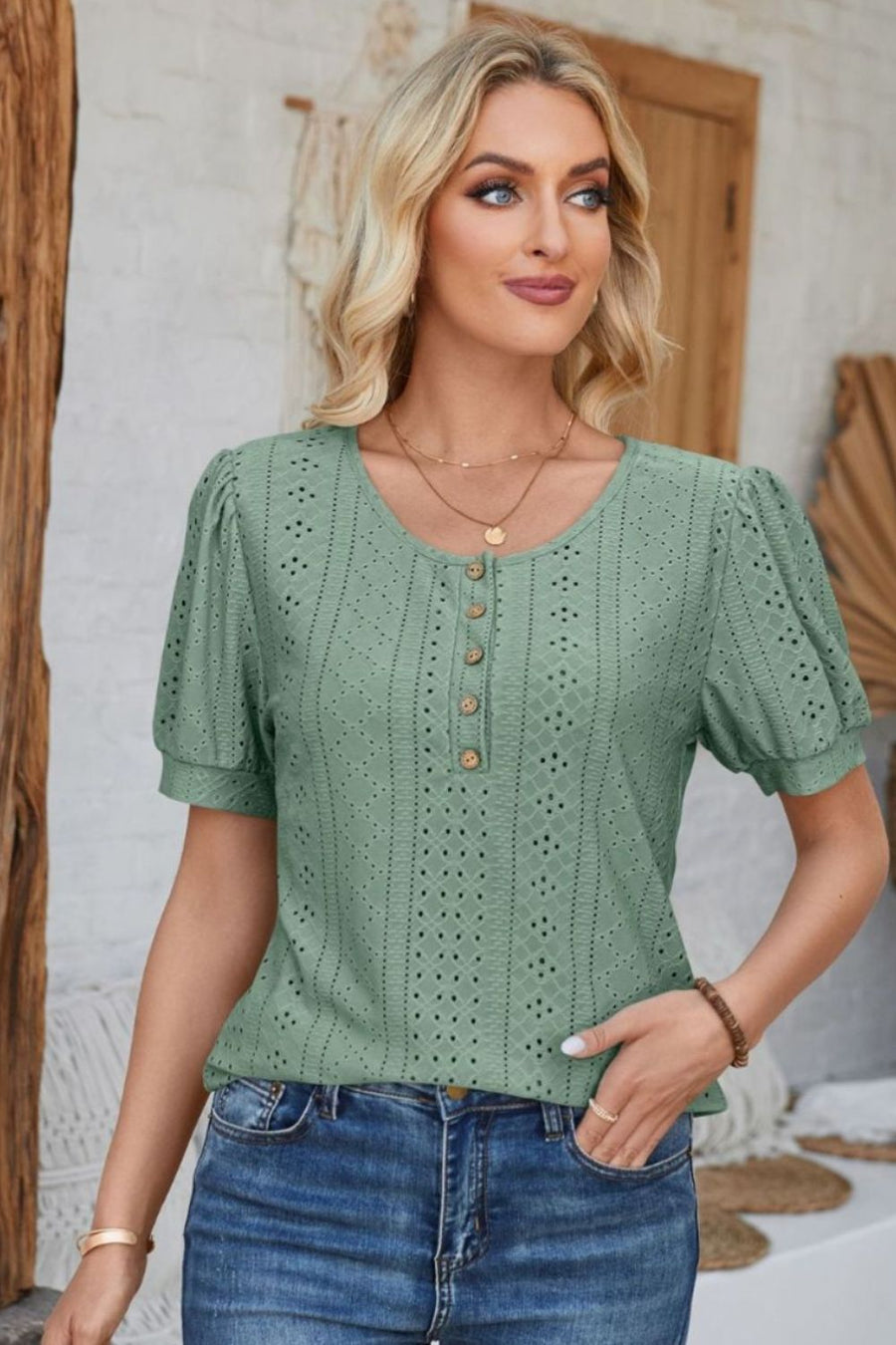 Sage green perforated puff sleeve henley blouse with button detail
